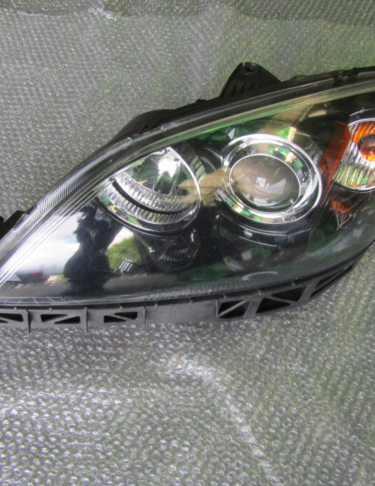 Farol (otica)Mazda 3 ano 2008